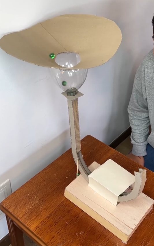 Maquina de movimiento perpetuo de canicas